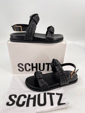SCHUTZ Black Braided Leather Flat Sandals with Gold Buckle